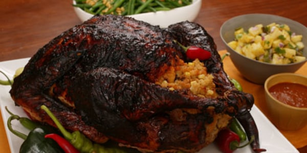 Mole-roasted turkey with masa stuffing and chile gravy